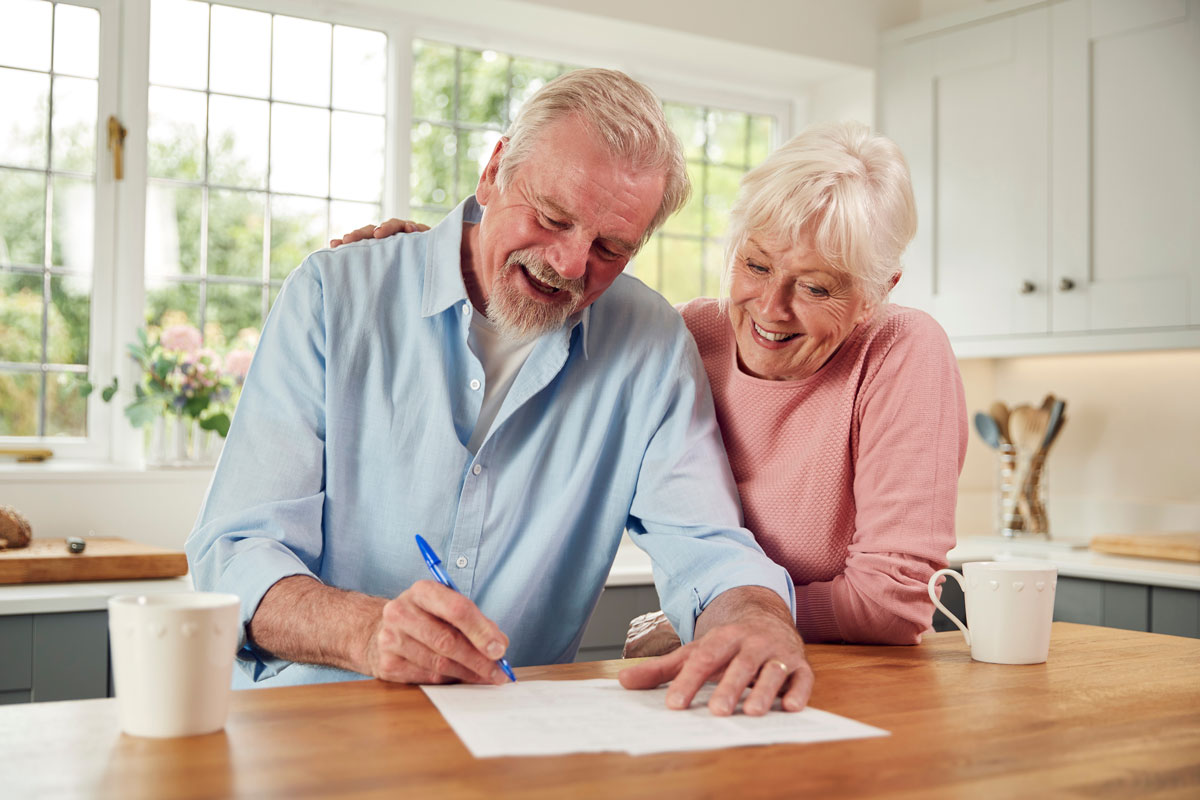 Couple Signing and Power of Attorney Document